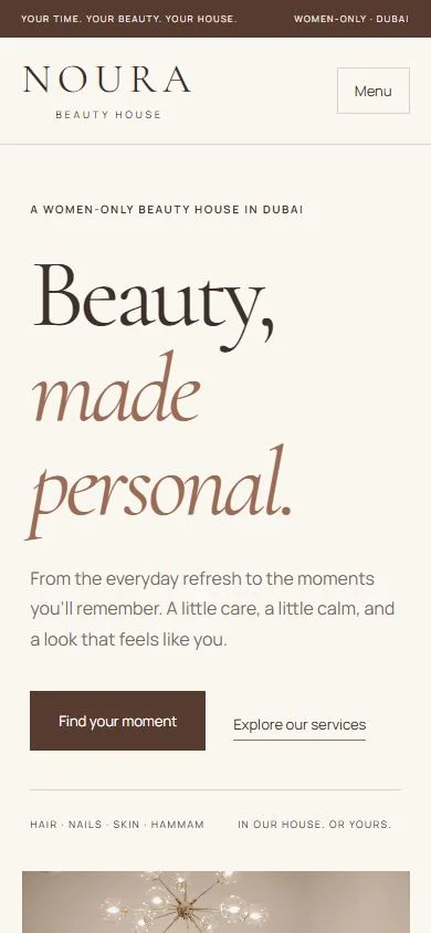Noura Beauty House: Homepage on a phone