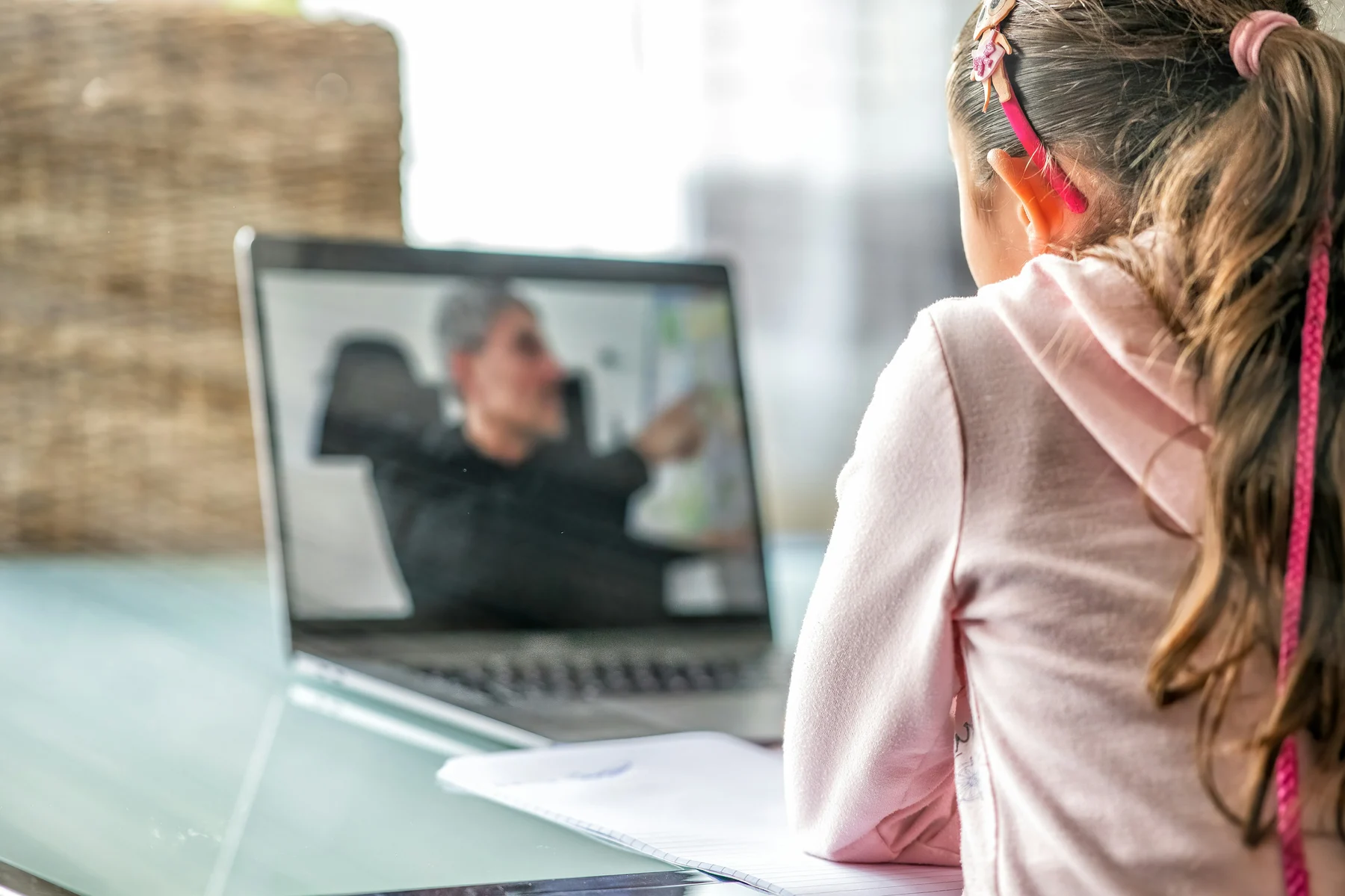 Child joining an online tutoring lesson