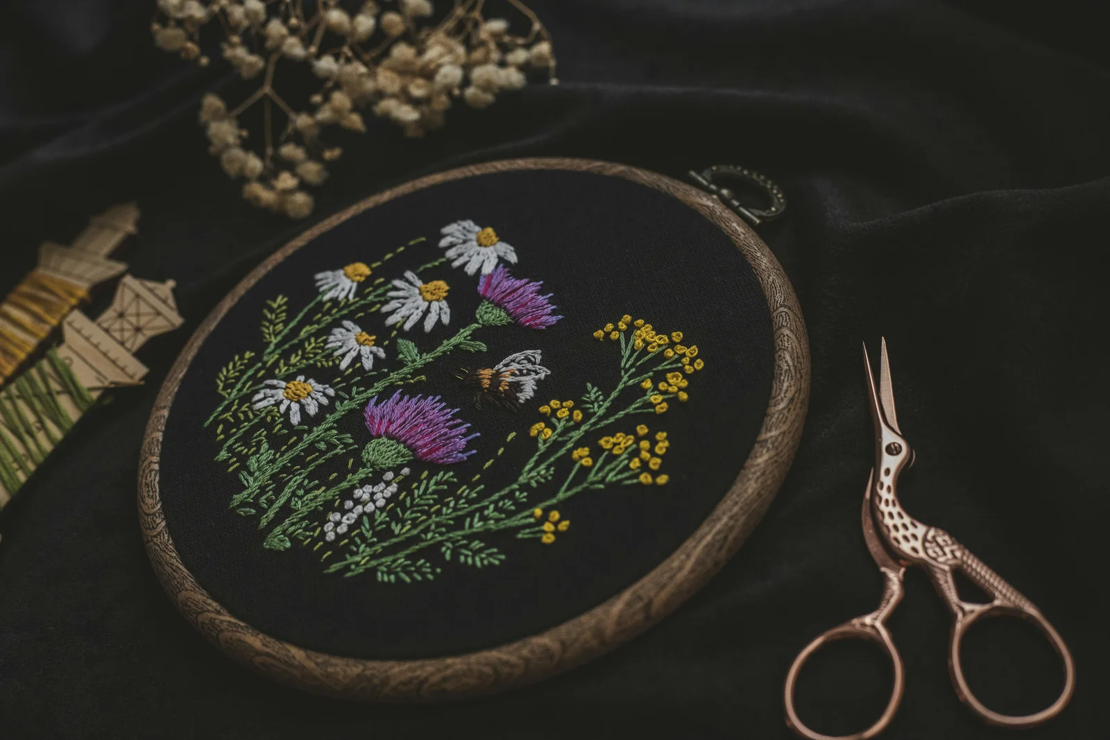 Botanical embroidery in a wooden hoop